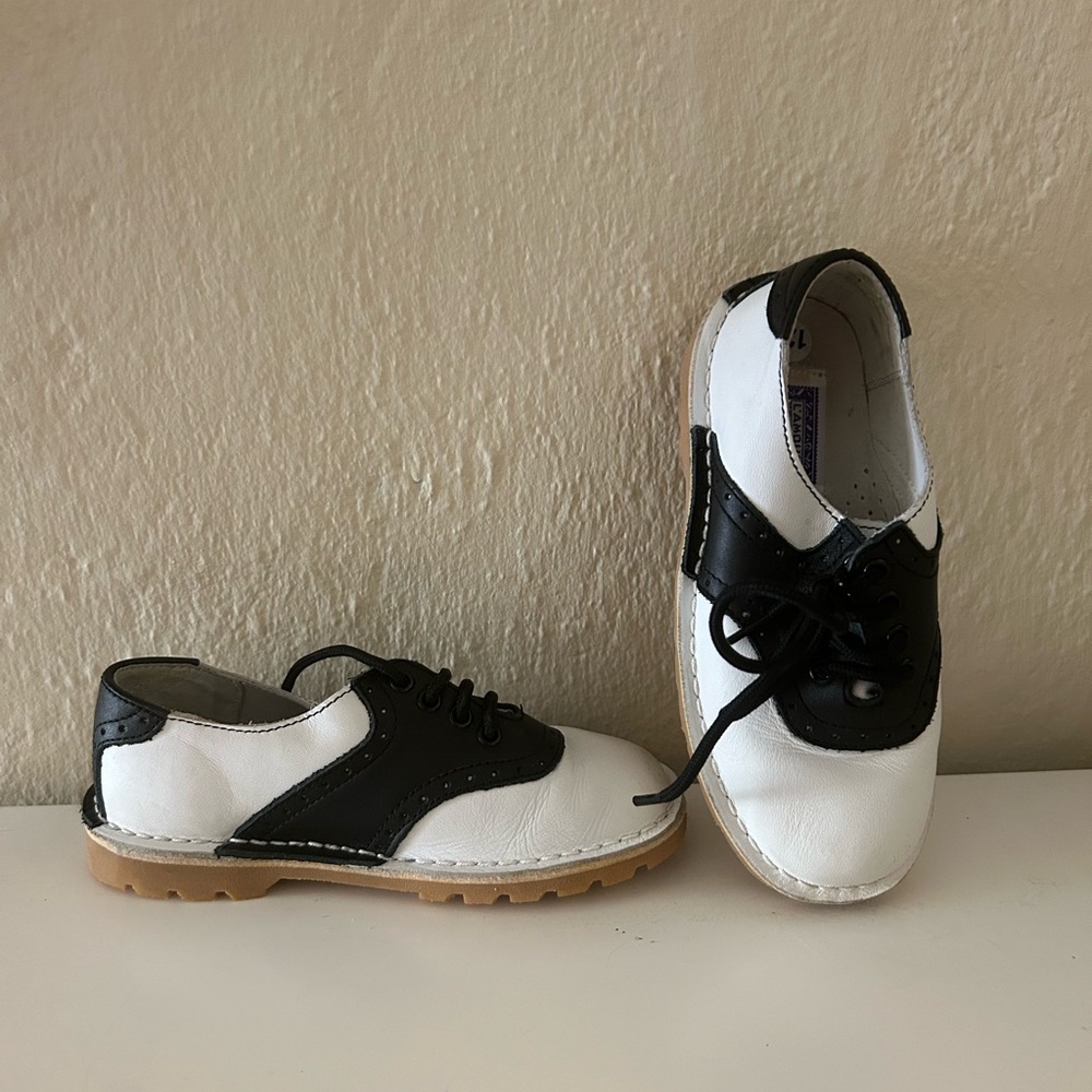 Little Boys dress shoes. Used. Slight scuff on left shoe.